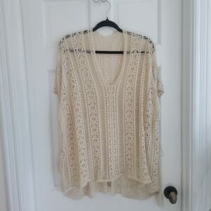 Woman's bohemian tie knit swimsuit coverup perfect for pool or beach